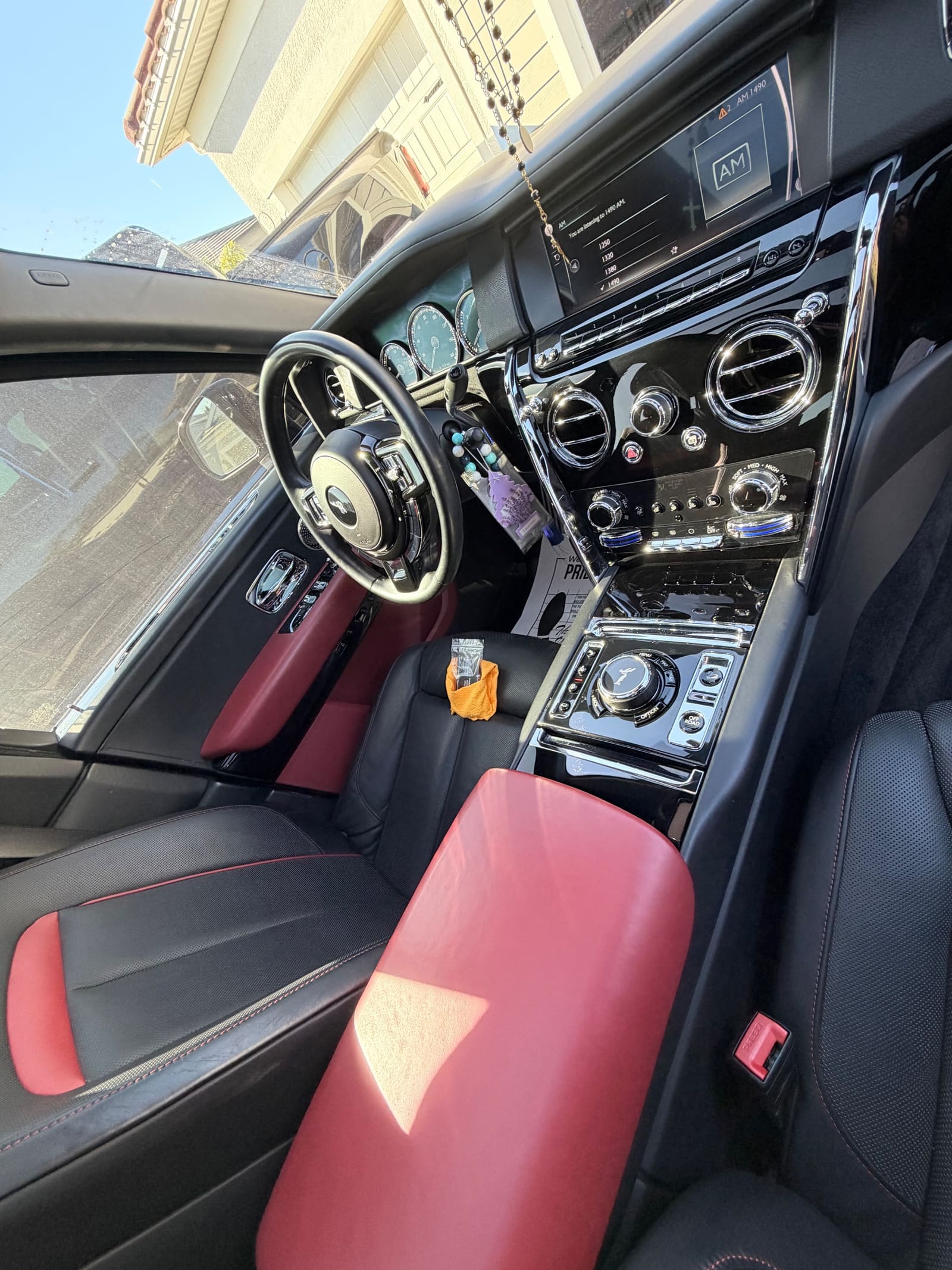 A luxury interior in cream and red leather after detailing